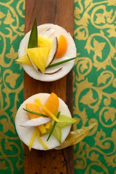 Talam Ubi (steamed sweet potato cakes with coconut milk and coconut strips, Indonesia)