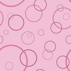 Seamless pattern from circles on a pink background.