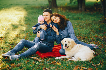 Fototapeta premium Beautiful family in a park