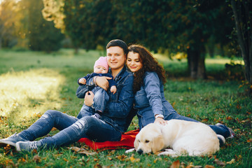 Fototapeta premium Beautiful family in a park