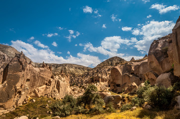 View from the structure of Cappadocia. Impressive fairy chimneys of sandstone in the canyon near Cavusin village, Cappadocia, Nevsehir Province in the Central Anatolia Region of Turkey. Overcast sky