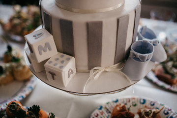 Beautiful birthday cake handmade in natural light catering for newborn child