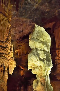 Diamond, stalactites and stalagmites have merged into a pillar, karst cave, Postojna, Slovenia, Europe