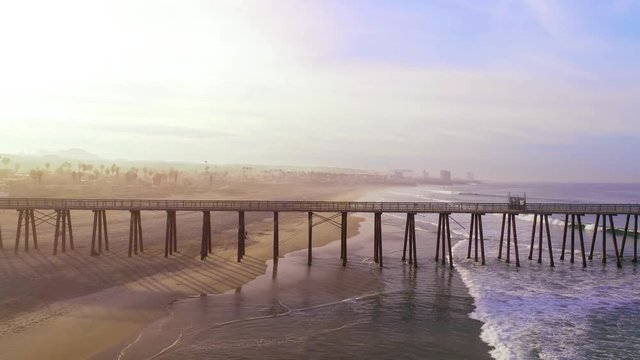 Rosarito Beach Pier lies on the coast of the Pacific Ocean on the Baja California Peninsula. The city is positioned between the foothills of the Peninsular Ranges and the ocean. 