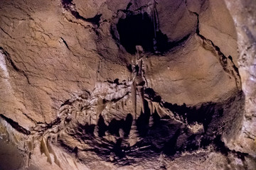 tourist landmark underground limestone cave with stalactites and stalagmites in the Crimea on mount AI-Petri