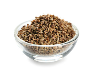 Glass bowl with caraway on white background