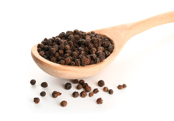 Wooden spoon with peppercorn on white background