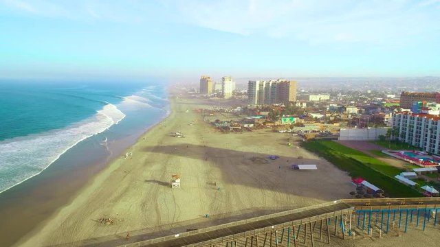 Rosarito Beach Hotel Aerial View from helicopter and drone including beach and ocean views pool and amenities of the hotel sun rise morning blue sky 