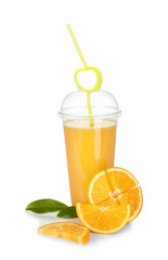 Plastic cup of orange juice and fresh fruit on white background