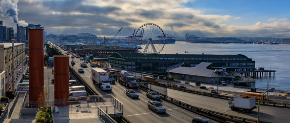 Seattle waterfront with Great Wheel and the Puget Sound on a cloudy day - obrazy, fototapety, plakaty