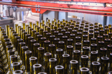 Wine bottles background, winemaking process to preparing wine for bottling in a winery