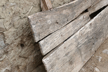 obsolete wooden planks, worn and deformed wooden planks in natural environment,