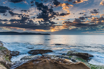 Naklejka premium Sunrise Seascape with Clouds