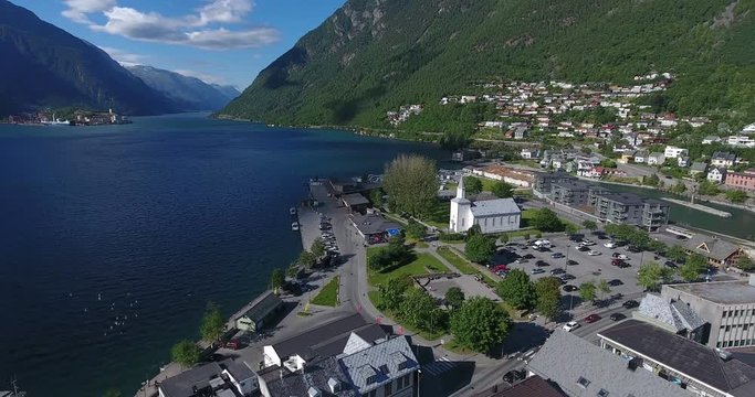 Center of Odda town with valley in mountains. Odda is tourist center and start point of road to Tyssedal to Trolltunga hiking route. Hordaland, Norway, Europe