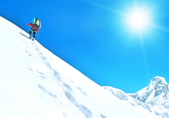 Extreme Sport. Lone hikers in winter mountains