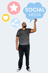 Man holding social media symbols