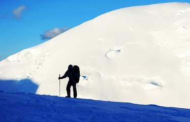 A lonely climber reaching the summit