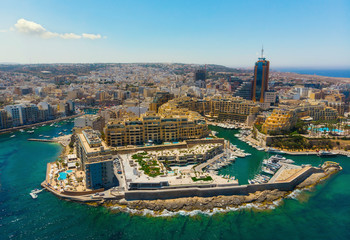 Arial view of St. Julian's city and Portomaso marina. Malta island. Sunny summer day.