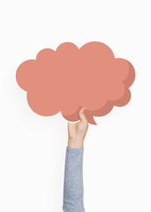 Hand holding a thought bubble cardboard prop