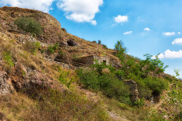 beautiful canyon at Khndzoresk cave settlement (13th-century, used to be inhabited till the 1950s) with a suspension bridge underneath, Syunik region, Armenia