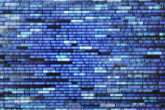Cyber world information transfer. digital binary numbers one and zero. blue and white text on black background.