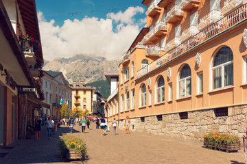 Fototapeta na wymiar Beluno, Italy-August 9, 2018: The mountain village of Cortina di Ampezzo.