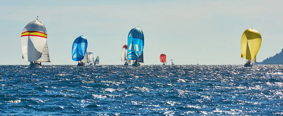 Classic yachts under sail with spinnakers at the regatta. Sailing yacht race. Yachting © Alvov