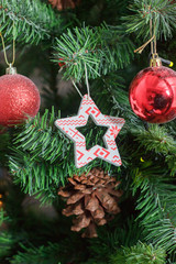 Christmas toys on the new year pine tree.