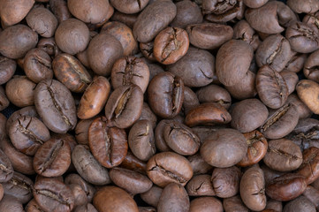 coffee grains background close-up around the frame