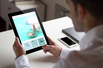 businessman dental clinic website  with tablet pc