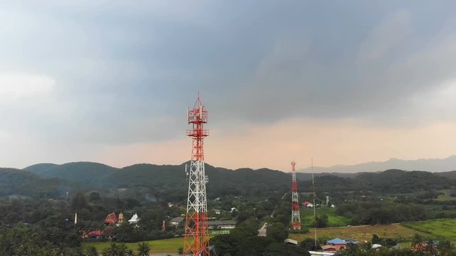 4K Drone shot aerial view scenic landscape of Communication tower with nature agriculture farm at rural countryside place