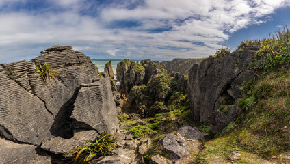 Punakaiki Pancake Rocks with blowholes in the Paparoa National Park, New Zealand