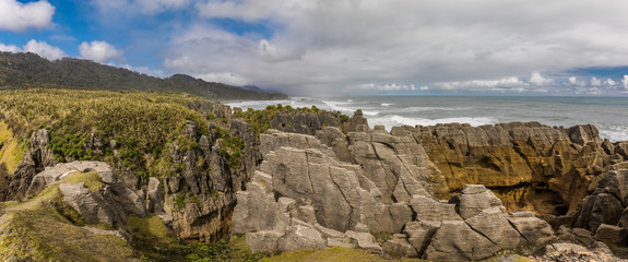 Punakaiki Pancake Rocks with blowholes in the Paparoa National Park, New Zealand