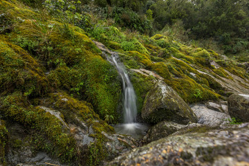 Blue water and rocks of the Hokitika Gorge Scenic Reserve, South Island New Zealand