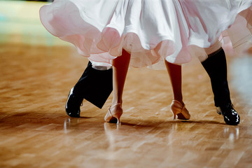 legs partner dancers man and woman in competitive dancesport