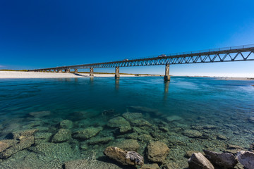 Naklejka na ściany i meble New Zealand's longest one-lane bridge over Haast River, South Westland