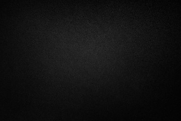 Black paper texture or background.
