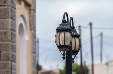 Old lantern on the street in the city