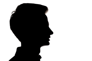 silhouette of young man face profile on a white isolated background