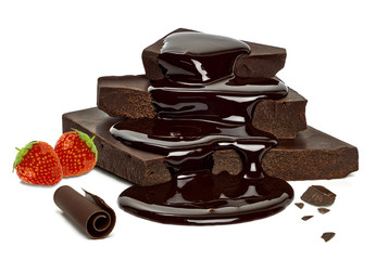 Chocolate sauce flow over cracked chocolate blocks on white background