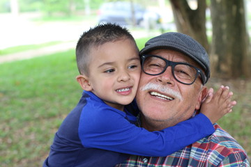 Grandson showing love for grandpa 