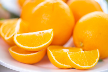 Fototapeta na wymiar Healthy fruits, many orange fruits background