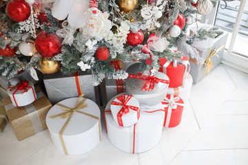 Boxes with gifts under the Christmas tree.