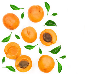 Apricot fruits with leaves isolated on white background. Top view. Flat lay pattern