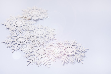 Snowflakes on Blue Background Holiday Festive Christmas Winter Concept Copy Space Top View Minimal