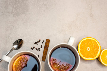 Hot mulled red wine on the concrete table