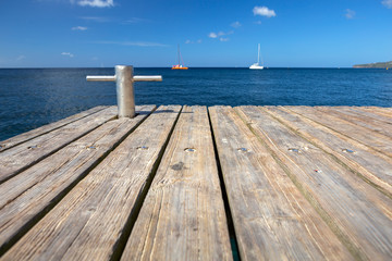 Caribbean sea and wood pier