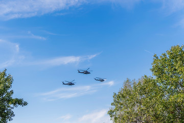 Greek Air Force Seahawk & Agusta Bell helicopters flying. SH Sikorsky Seahawk & Agusta Bell AB-212 frigate Anti Submarine Warfare helicopters during military parade in Thessaloniki.