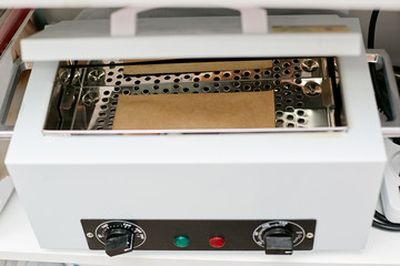 Dry heat cabinet, sterilizer in the beauty salon