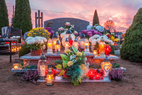 Candles Burning At a Cemetery During All Saints Day. 